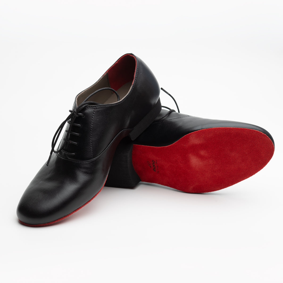Mono El Caballero tango oxford turned over to show the optional red suede sole with the Mono logo