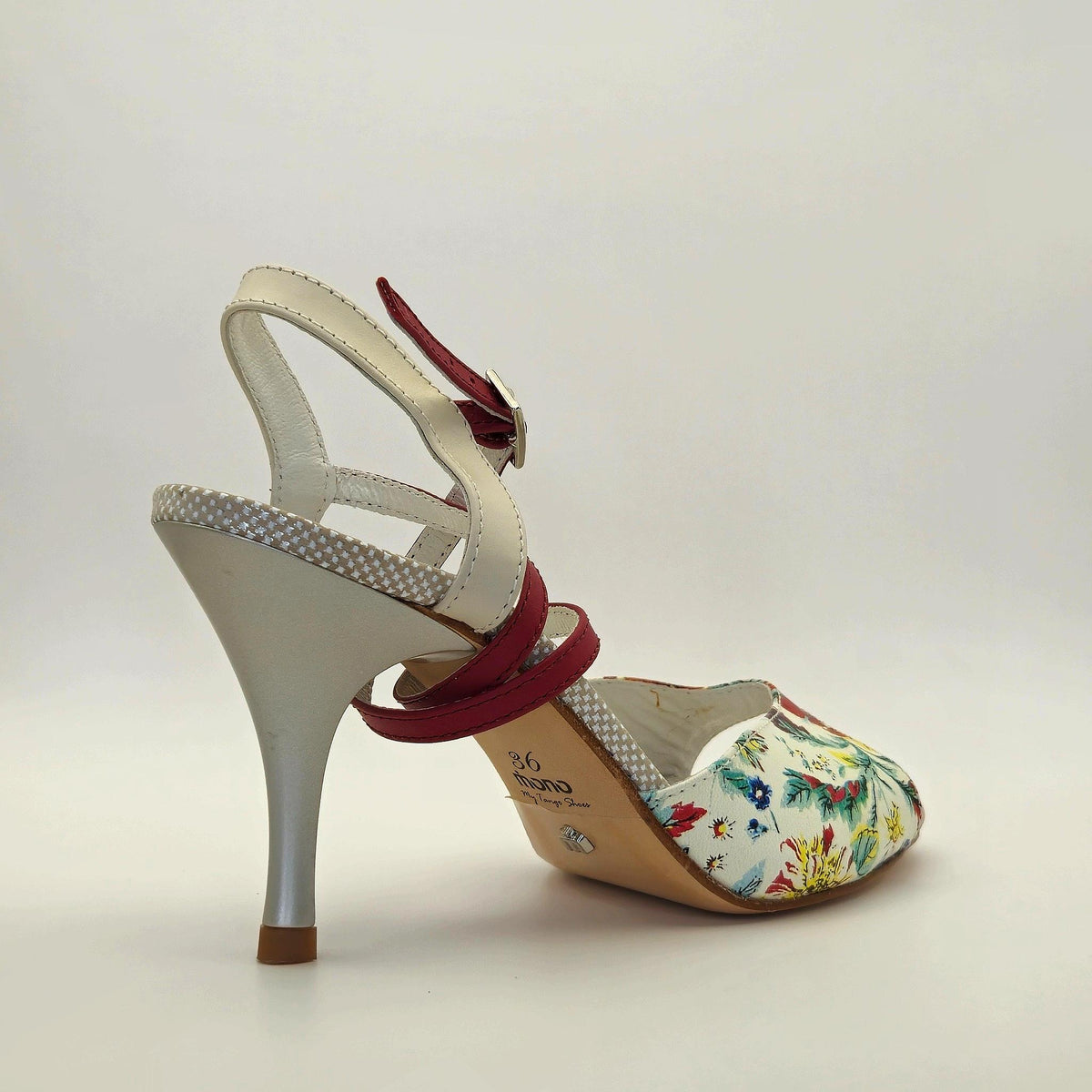 Side profile of Mono Scarlet Bloom women's tango sandal facing right, alternate angle showing sole edge and floral upper pattern.